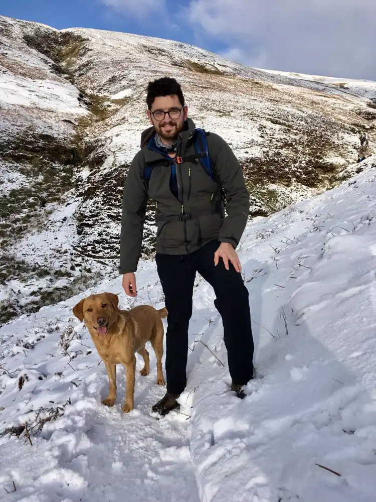 Jacob Hinson, founder of eLocker, with his dog